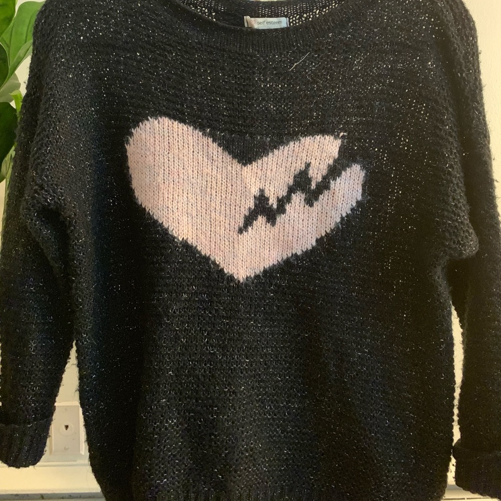 Cute black sweater with pink heart pattern